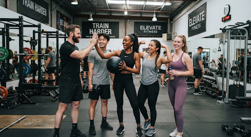 students working out together in a gym